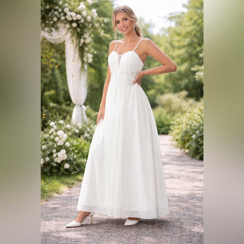 Elegant White Spaghetti-Strap Wedding Gown with Lace Bodice